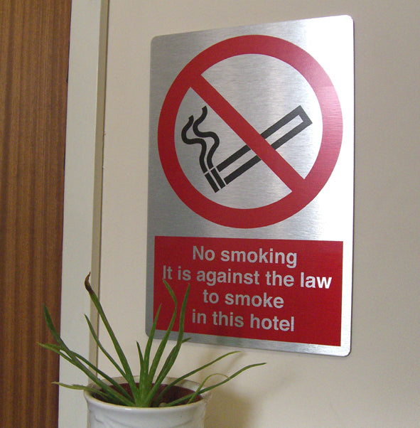 No smoking It is against the law to smoke in this hotel - Direct Signs