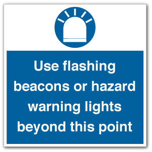 Use flashing beacons or hazard warning lights beyond this point - Direct Signs