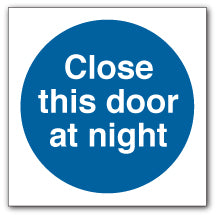 Close This Door at Night Circle Sign - Direct Signs